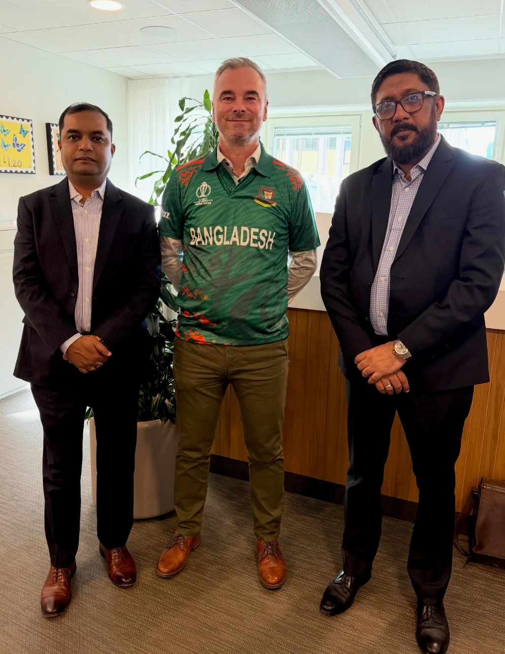 Three colleagues together in an office during the documented Sweden visit.